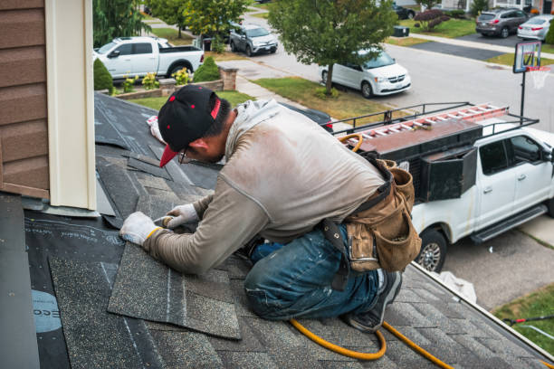 Professional Roofing technician working in Warrensburg, IL